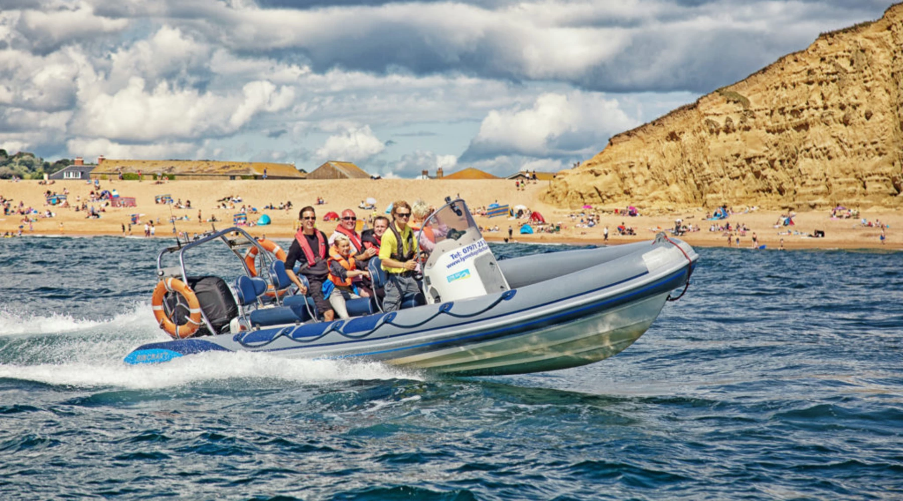 A group of people on a RIB Charter